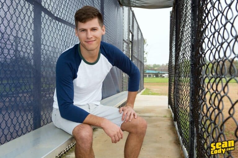 Sean Cody Emmett strips out of his baseball kit and jerks out a huge cum load